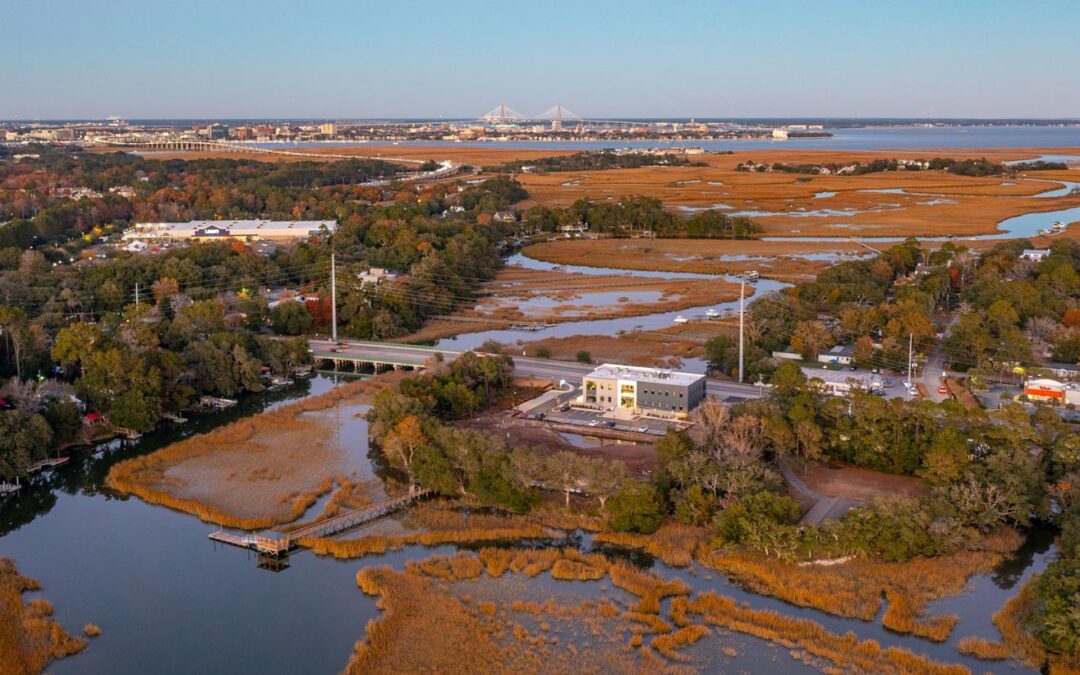 Sunset Aerial Photo of Creekside with Ellis Creek in the foreground and the Ravenel Bridge in the background